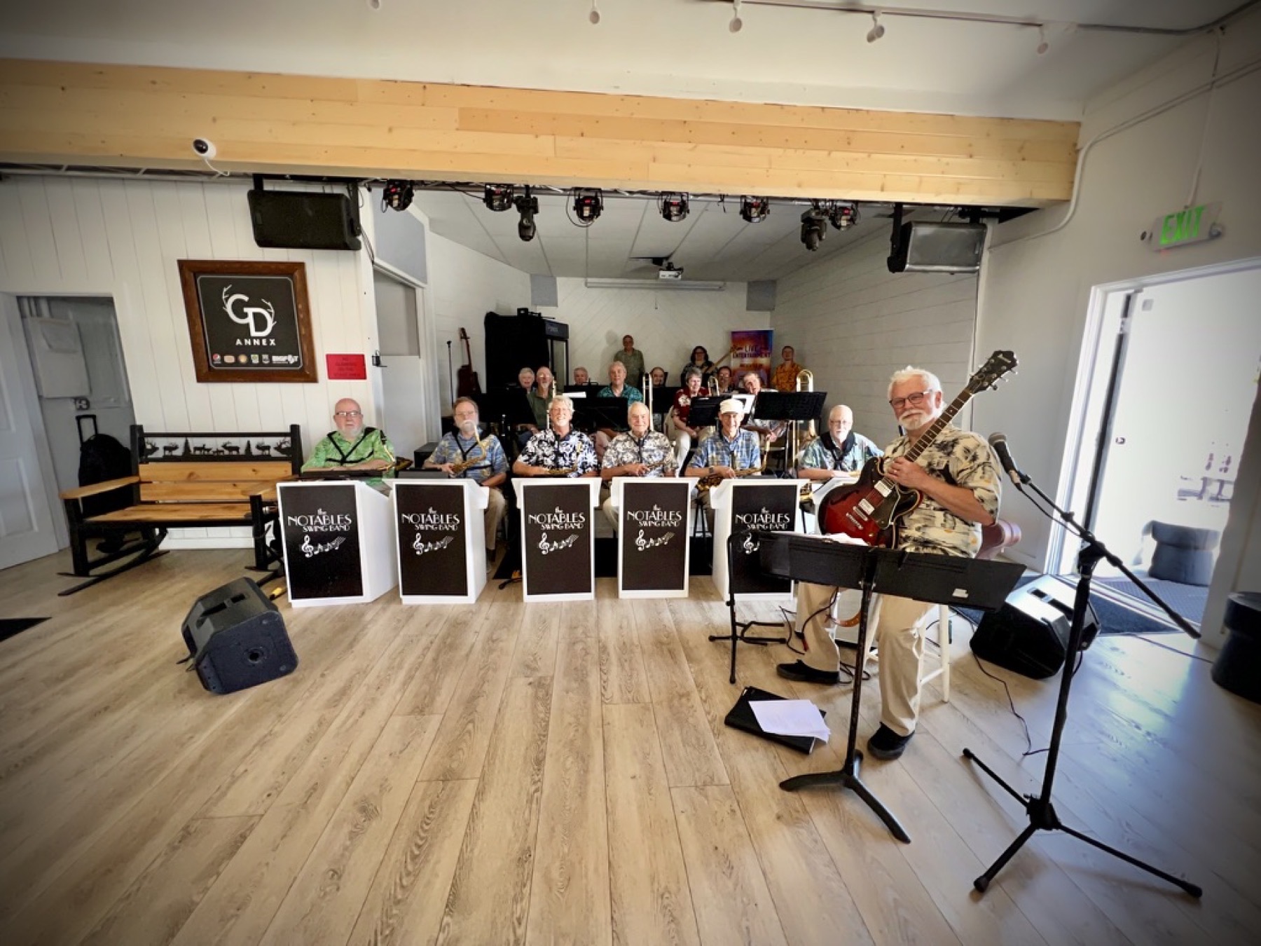 Notables Swing Band group photo with Lonnie holding a guitar